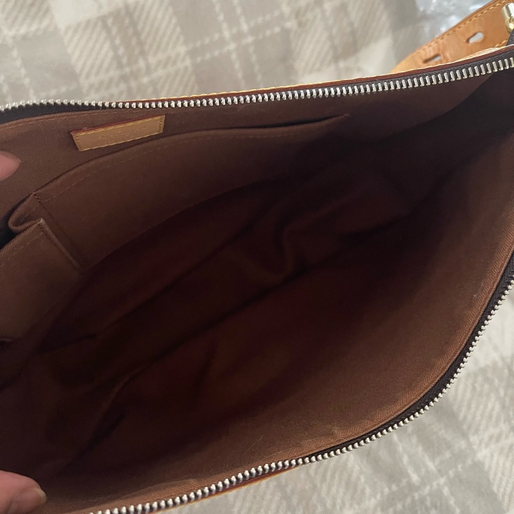 Authentic Louis Vuitton Tulum GM - Picture 5 of 7